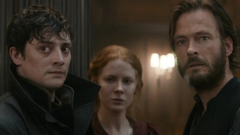 Aneurin Barnard as Daniel, Emily Beecham plays Maura Franklin, and Andreas Pietschmann as Eyk Larsen in 1899