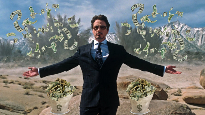Tony Stark (Robert Downey Jr.) presents the Jericho in "Iron Man" featuring dollars raining down