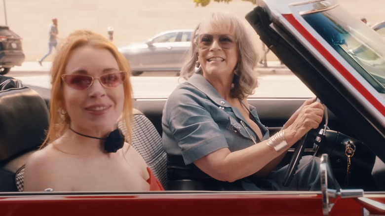 Anna (Lindsay Lohan) and Tess (Jamie Lee Curtis) as Harper and Lily in a convertible in Freakier Friday