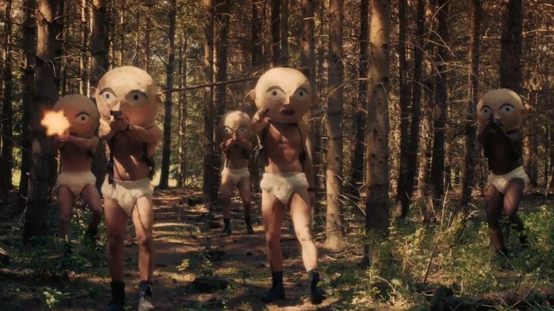 Squad of men in diapers with baby heads on