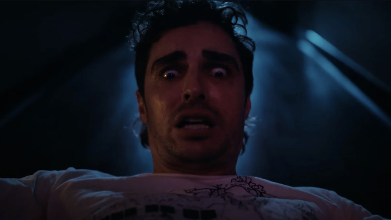Dave Franco as Tim looking horrified in TOGETHER