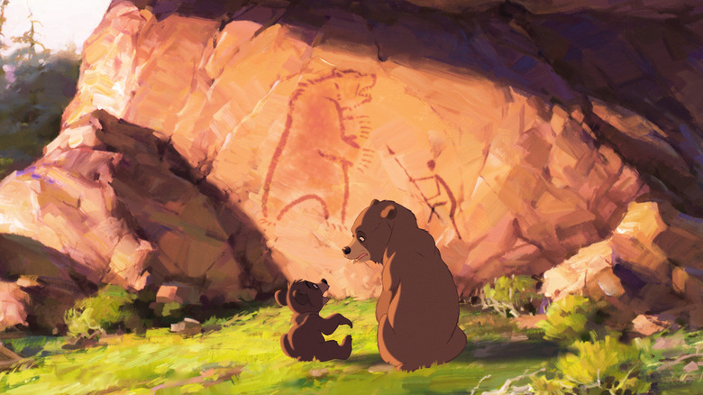 The bears looking at a painting on a rock in Brother Bear