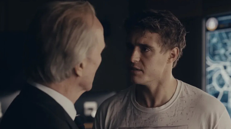 Joe Turner (Max Irons) speaks to Bob Partridge (William Hurt) in Condor