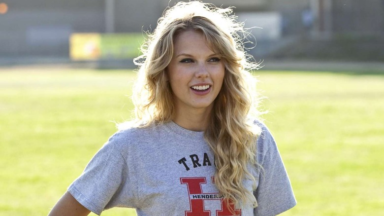 Felicia smiling wearing her track shirt in Valentine's Day