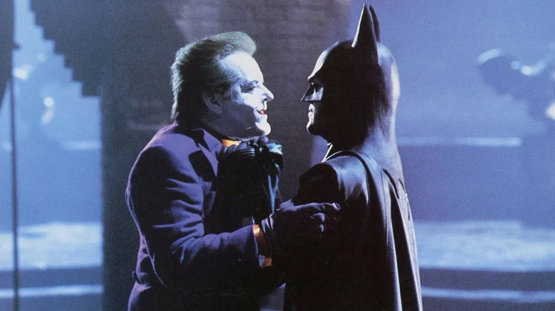 Batman (Michael Keaton) holding the Joker (Jack Nicholson) by his lapels in Batman (1989)