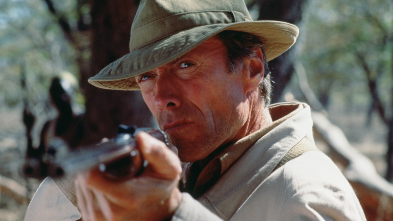 Clint Eastwood wields an elephant gun as John Wilson in White Hunter, Black Heart