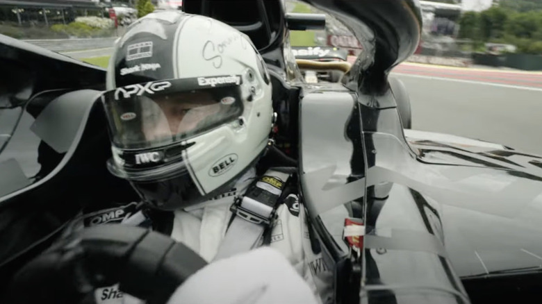 Sonny Hayes behind the wheel of an F1 racer in F1