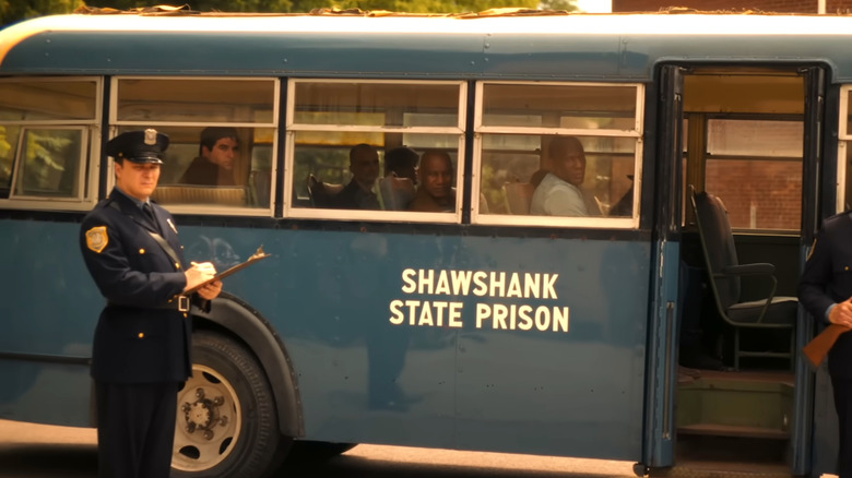 IT: Welcome to Derry, a bus labeled 'Shawshank State Prison' with prisoners inside it
