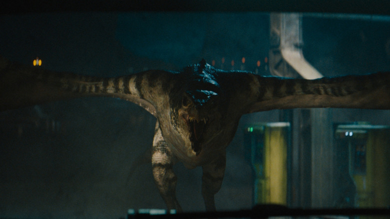 The Mutadon running towards the car in Jurassic World Rebirth