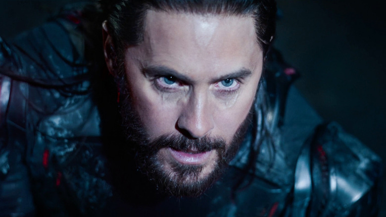 Jared Leto as Ares crouched and looking serious in Tron: Legacy