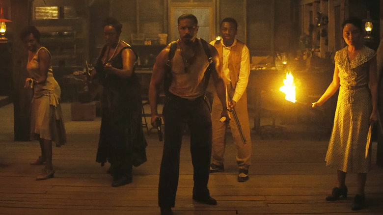 Pearline (Jayme Lawson), Annie (Wunmi Mosaku), Smoke (Michael B. Jordan), Sammie (Miles Caton), and Grace (Li Jun Li) stand ready for battle in Sinners