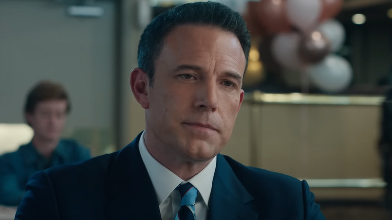 Ben Affleck as Christian Wolff at a speed dating event in The Accountant 2