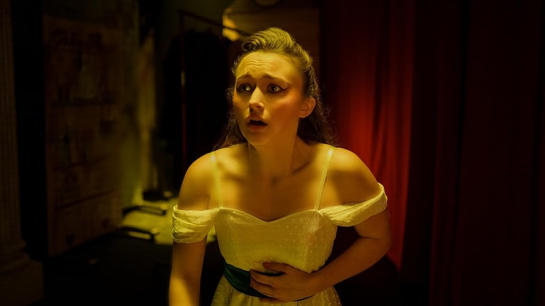 India Fowler as Lori Granger looking scared in Fear Street: Prom Queen