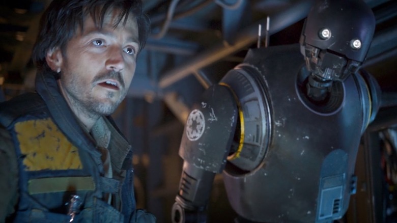 Cassian and K-2SO on the bridge of a ship