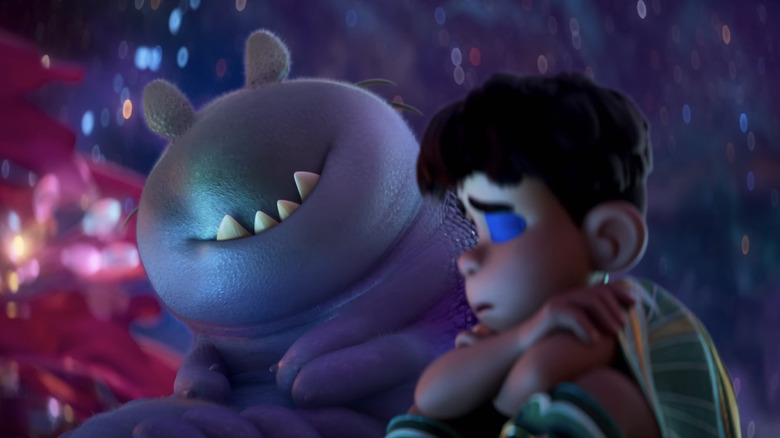 Glordon comforts a sad Elio in the Communiverse
