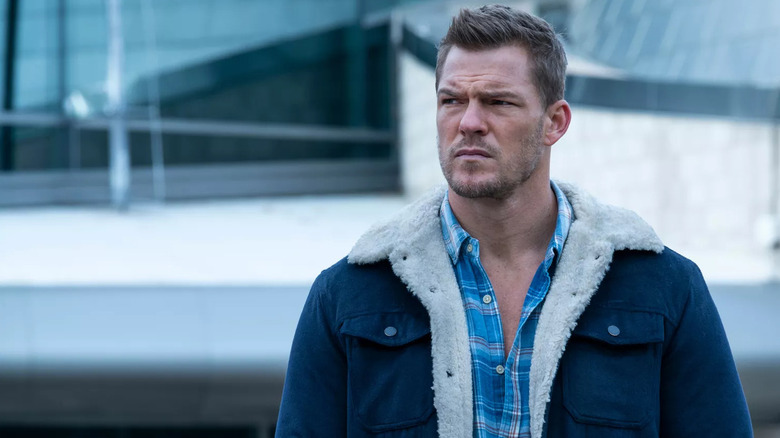 Alan Ritchson as Hank Hall looking somber in Titans