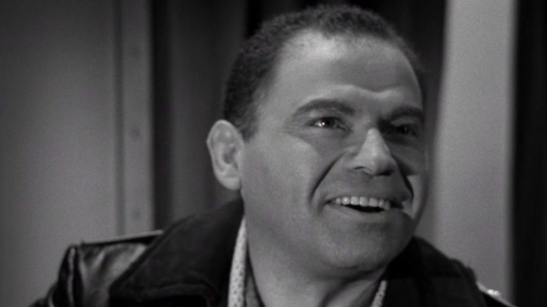 Carl Lanser smiling evilly in the Twilight Zone episode Judgement Night