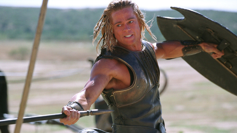 Brad Pitt as Achilles fighting with his sword and shield in Troy