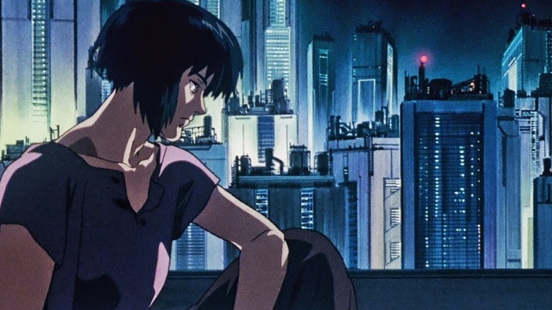 Makoto Kusanagi overlooks the big ciy in Ghost in the Shell