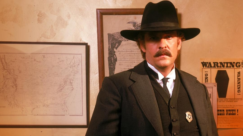 Michael Madsen as Virgil Earp in Wyatt Earp