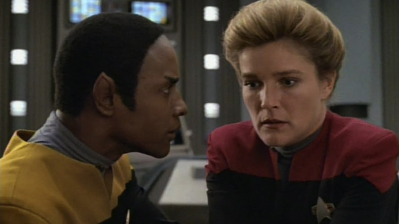 Captain Janeway looking haunted in Star Trek: Voyager
