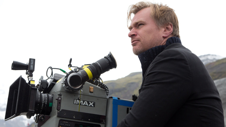 Christopher Nolan shooting a scene with an IMAX film camera