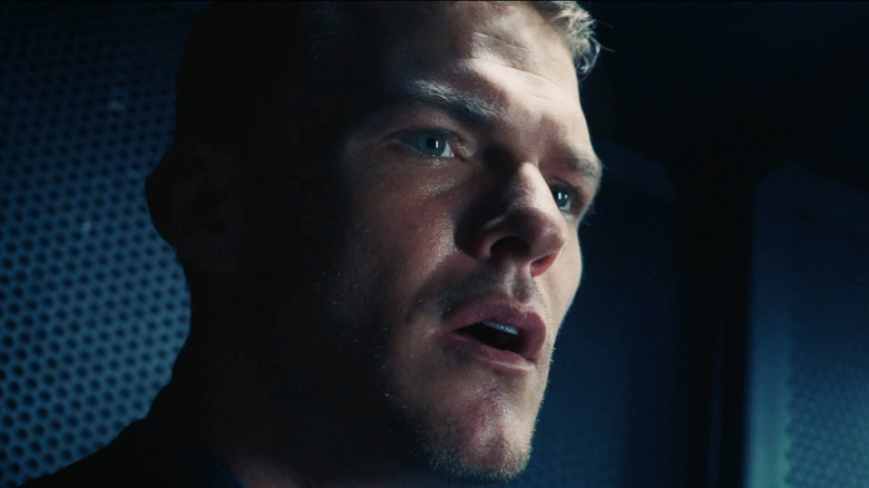 Alan Ritchson as Agent Carver looking surprised in closeup in Dark Web Cicada 3301