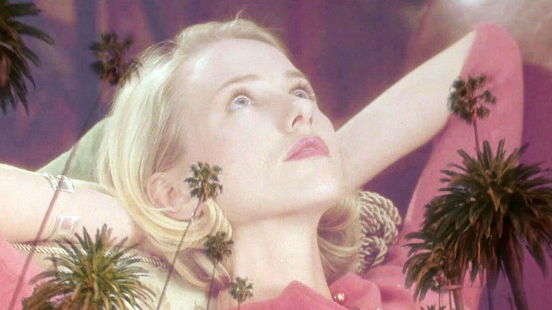 Naomi Watts as Betty in Mulholland Drive superimposed with Hollywood palm trees