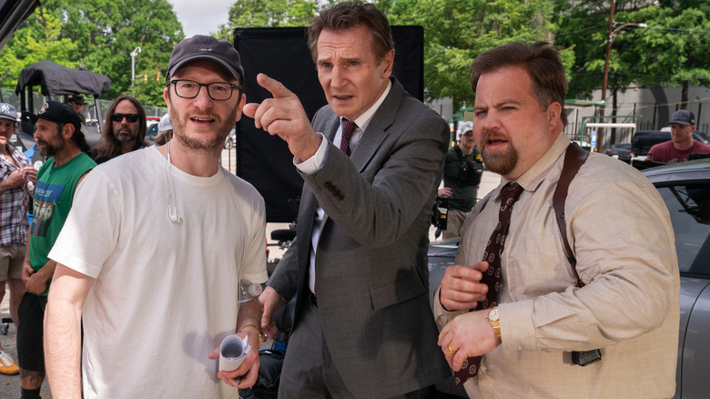 The Naked Gun director Akiva Shaffer on set with Liam Neeson and Paul Walter Hauser