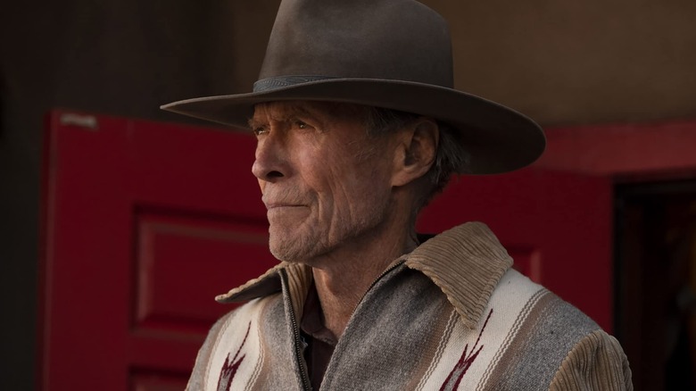 Mike Milo wearing a cowboy hat in Cry Macho