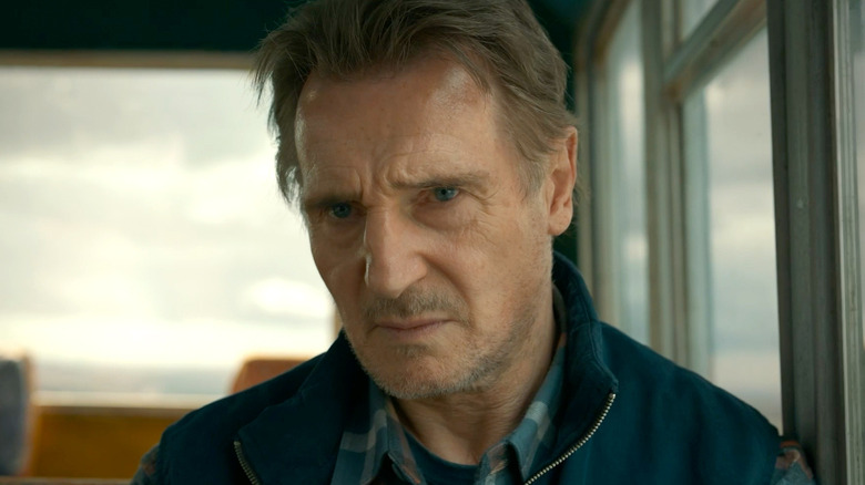 A close up of Mike McCann sitting in a bus in 