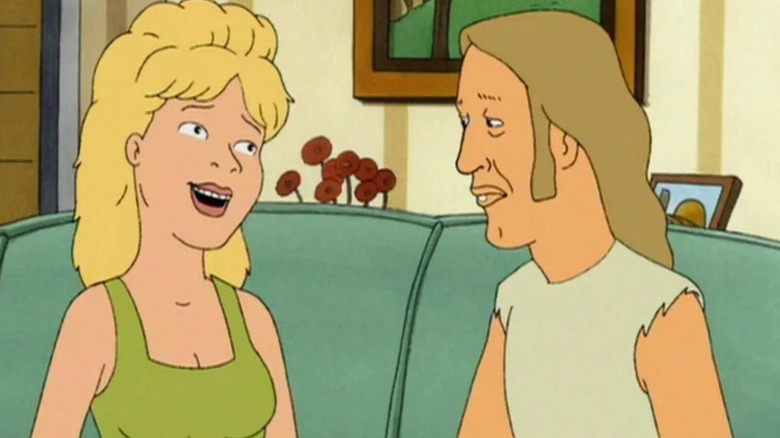 Luanne and Lucky sitting on a couch in King of the Hill