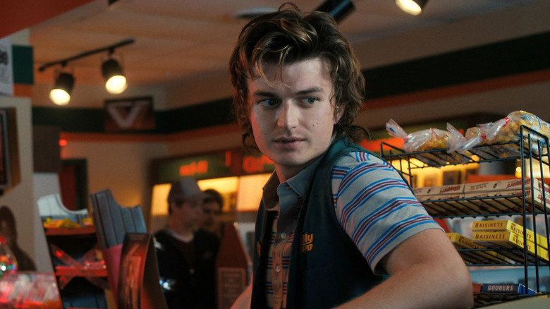 Steve working at the video store candy counter in Stranger Things season 4