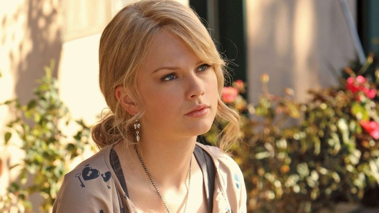Haley with blonde hair looking at someone on CSI