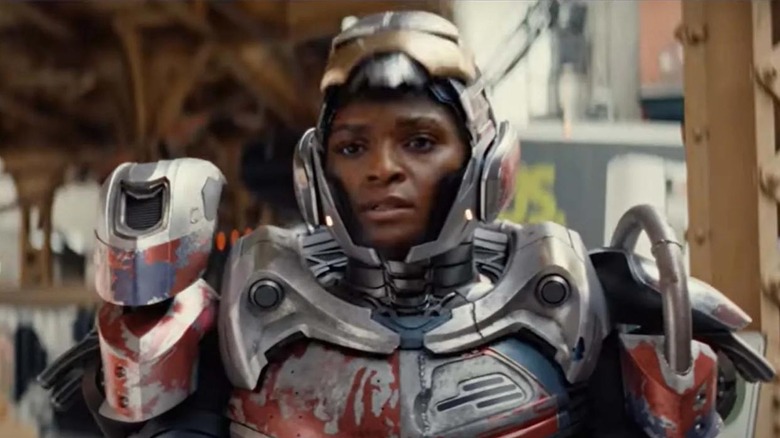 Riri Williams in her Ironheart suit, looking out on a street