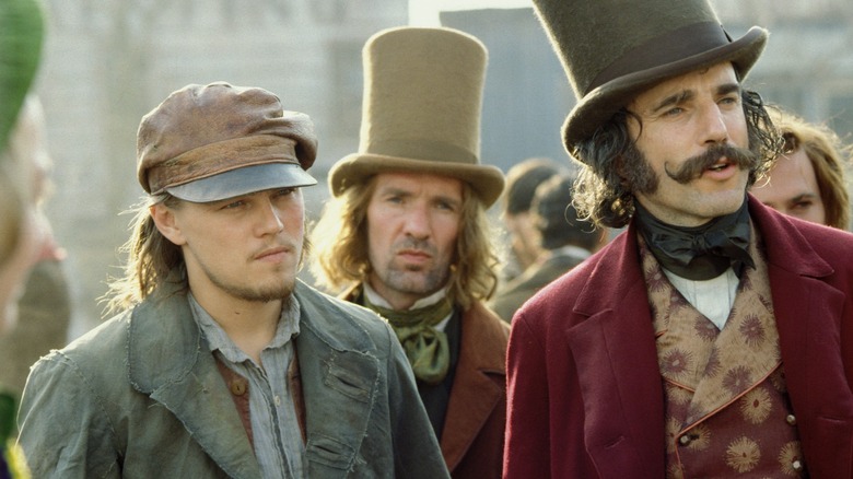 Amsterdam and Bill the Butcher stand among the crowd in Gangs of New York