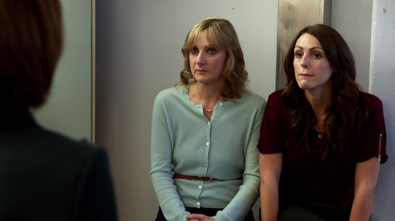 Janet Scott (Lesley Sharp) and Rachel Bailey (Suranne Jones) sit next to each other bemused in Scott & Bailey