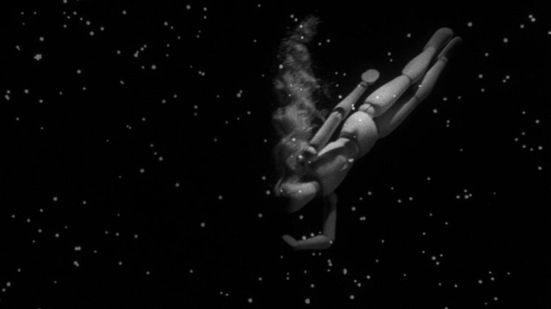 A doll flying through space in the opening sequence for The Twilight Zone