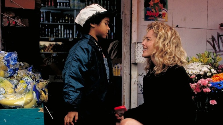 Sharon Stone as Gloria Swenson shares a moment with Jean-Luke Figueroa as Nicky Nunez in Gloria (1999)