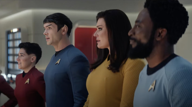 The cast of Star Trek: Strange New Worlds standing alongside each other