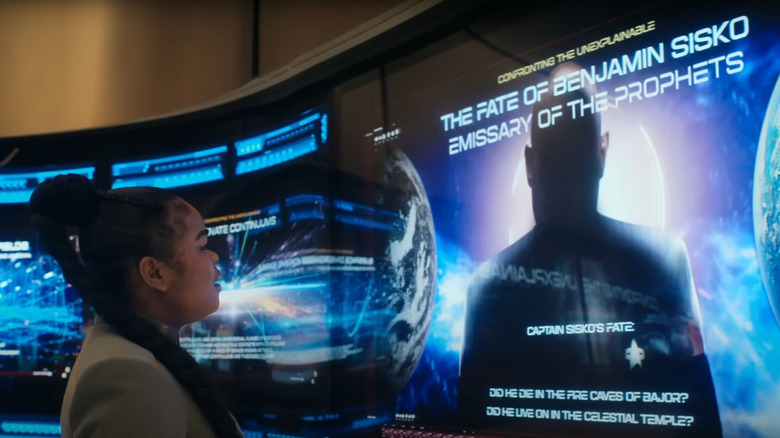 Kerrice Brooks as Starfleet cadet Sam gazing at a museum installment of Avery Brooks' Benjamin Sisko in Starfleet Academy