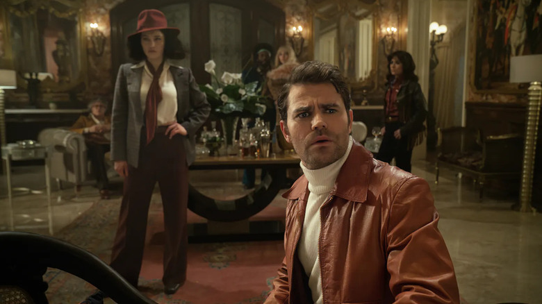 James Kirk in old fashioned civilian clothes, looking confused