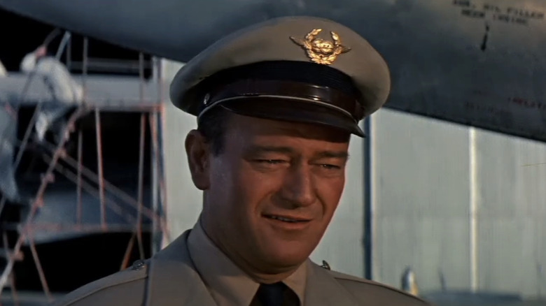 Roman (John Wayne) steers the plane in The High and the Mighty