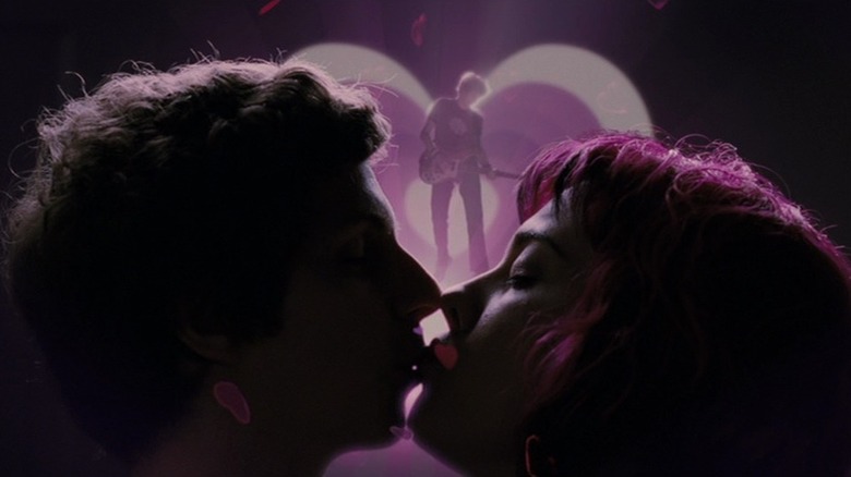 Michael Cera as Scott Pilgrim kissing Mary Elizabeth Winstead as Romona Flowers with hearts in the background in Scott Pilgrim vs. the World