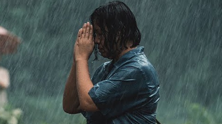 Praying in the rain
