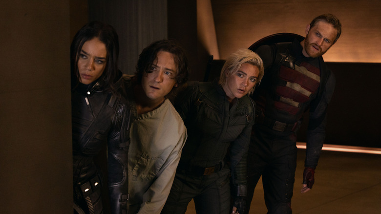 Ghost, Bob, Yelena, and Walker peeking around a corner in Thunderbolts