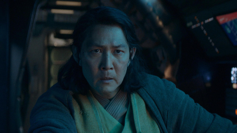 Lee Jung-jae as Master Sol in the cockpit of his ship in Star Wars: The Acolyte