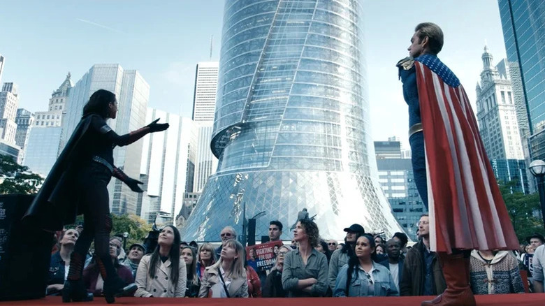 Aya Cash as Stormfront and Antony Starr as Homelander in front of Vought Tower on The Boys