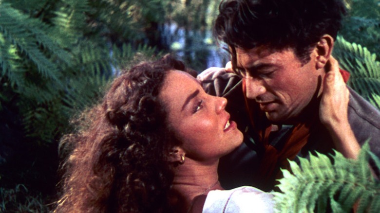 Jennifer Jones as Pearl Chavez holds Gregory Peck as Lewton McCanles in Duel in the Sun