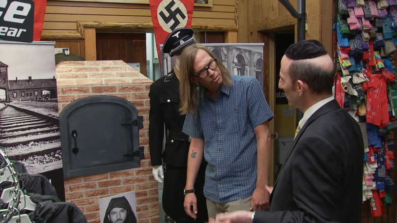 Nathan For You, a shop owner reacts to Nathan's new Holocaust awareness display